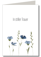 In stiller Trauer blaue Blumen